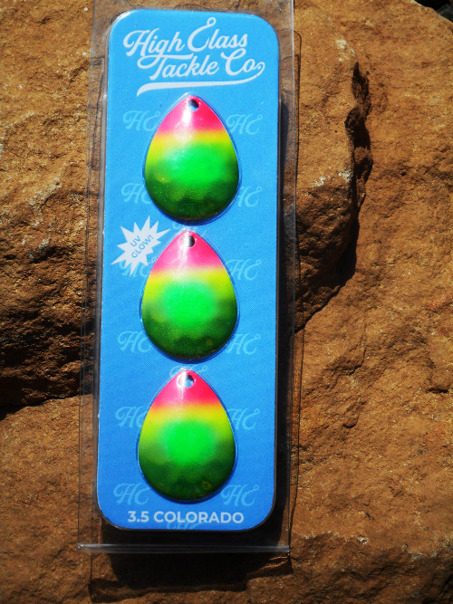 A chaertreuse, pink, and green rainbow steelhead and salmon spinner blade