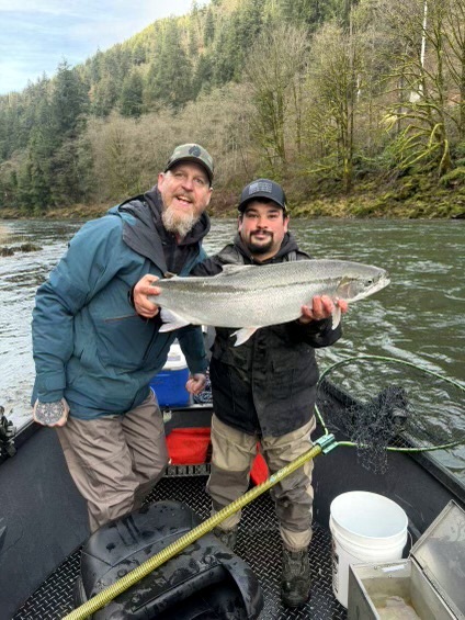Hebo fishing guide with happy Winter Steelhead client