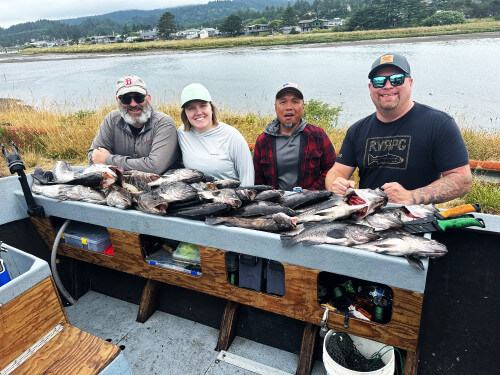  Our Hebo Sporting Goods Guide with his customer's bottomfish day's catch