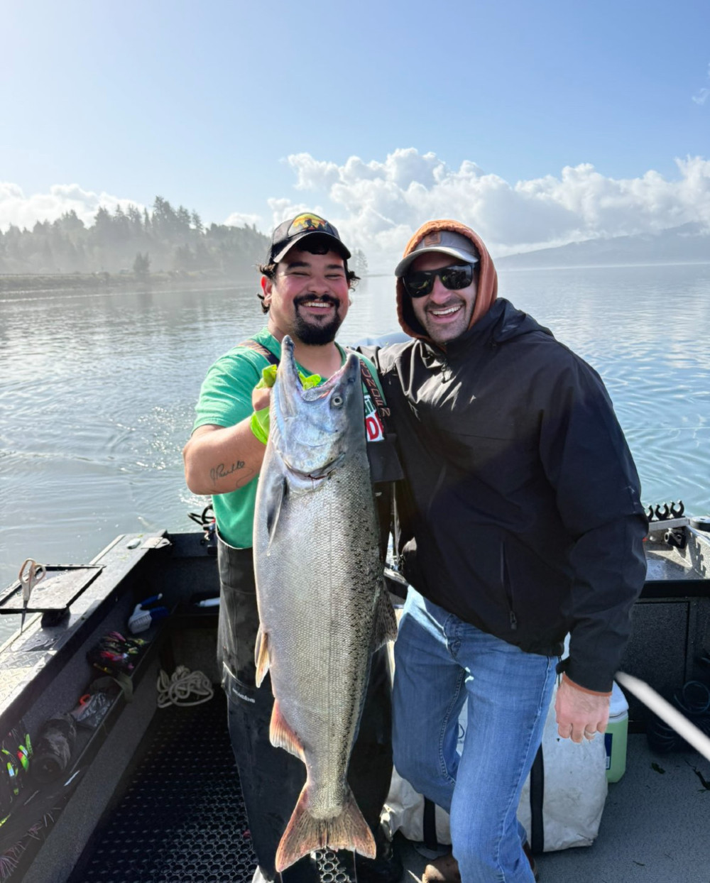 Hebo Tackle Shop guide with his cxlient and a Chinook Salmon